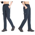 Pantalón femenino resistente al agua e
resistente al viento, gris.