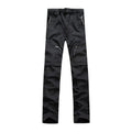 Pantalón impermeable convertible en bermuda, cintura elástica con ajuste, negro.