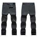 Pantalón térmico con forro de fleece interno, gris oscuro.