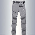 Pantalón masculino transpirable y de secado rápido, gris claro.