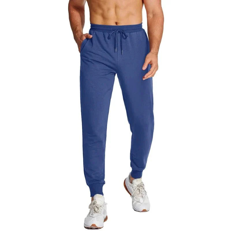 Pantalón masculino deportivo con tejido Quick Dry que elimina la humedad, manteniéndote seco durante entrenamientos intensos, azul.