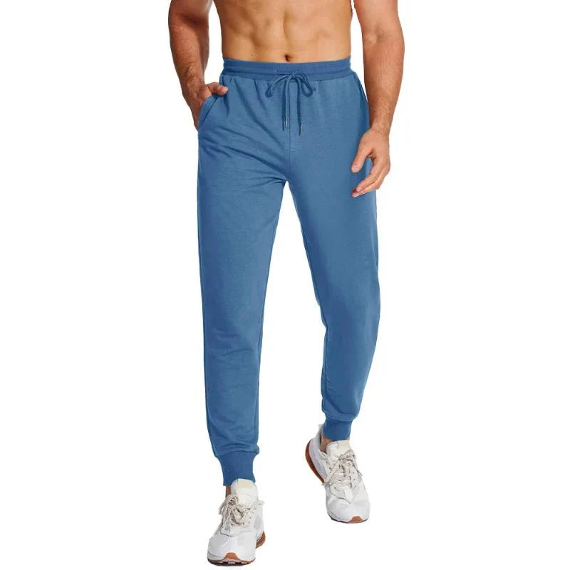 Pantalón masculino deportivo con tejido Quick Dry que elimina la humedad, manteniéndote seco durante entrenamientos intensos, azul.