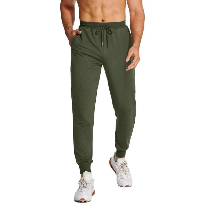 Pantalón masculino deportivo con tejido Quick Dry que elimina la humedad, manteniéndote seco durante entrenamientos intensos, verde.