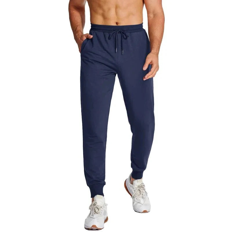 Pantalón masculino deportivo con tejido Quick Dry que elimina la humedad, manteniéndote seco durante entrenamientos intensos, azul.