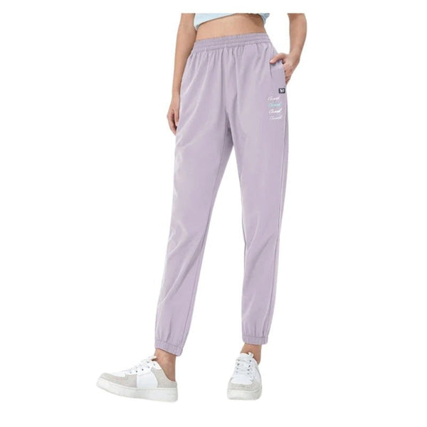 Pantalón femenino deportivo, diseñado para ofrecer comodidad y ligereza lila.