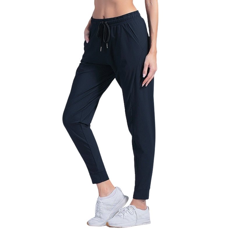 Pantalones de mujer súper confort.
Modelo con tira al tobillo acanalada - Azul