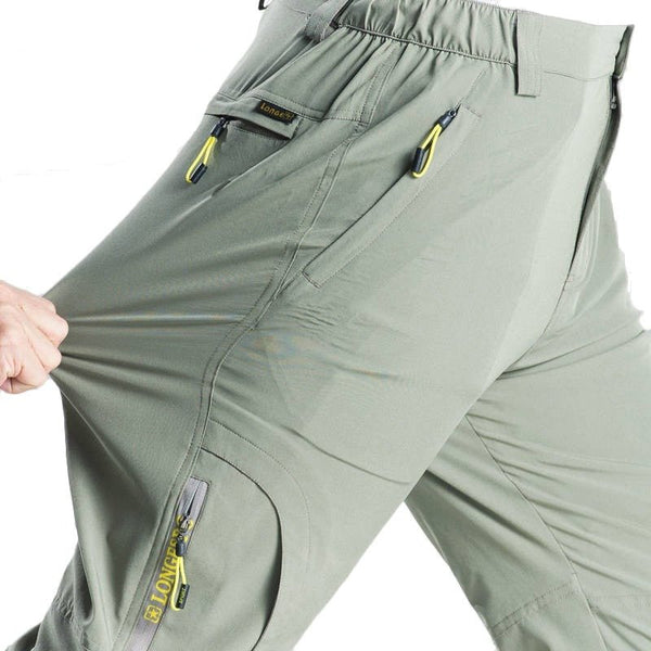Pantalón elástico, secado rápido, verde claro.
