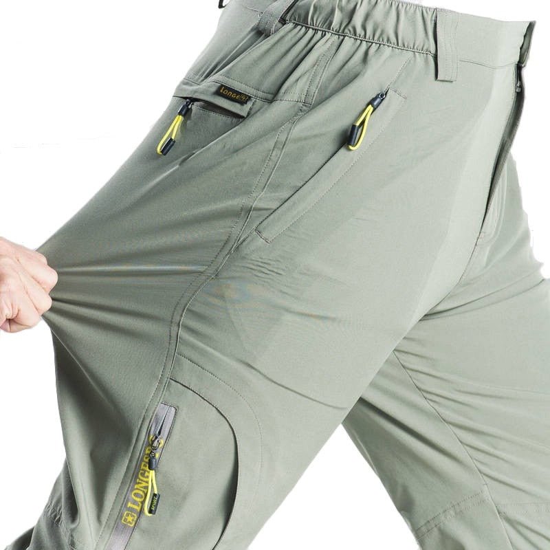 Pantalón elástico, secado rápido, verde claro.
