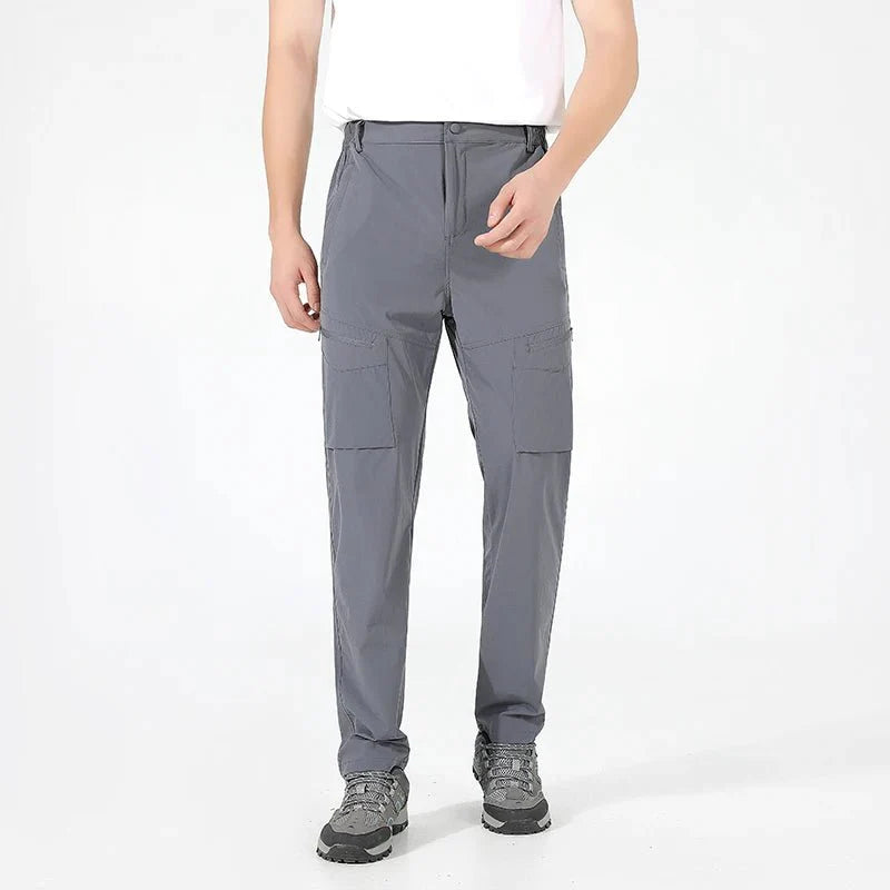 Los pantalones de hombre son de tela ligera, transpirable y resistente al desgaste - Gris