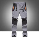 Pantalones ligeros de hombre recortes que garantizan flexibilidad de movimiento, color gris