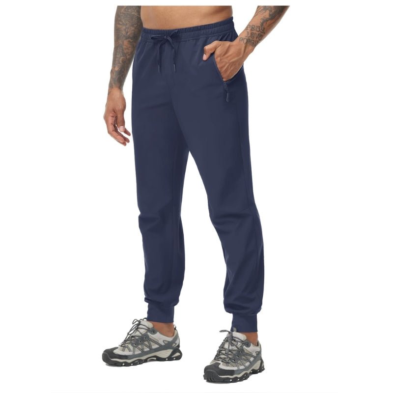 Pantalón de hombre con cinturilla elástica tejido 92% poliéster 8% elastano, color azul oscuro
