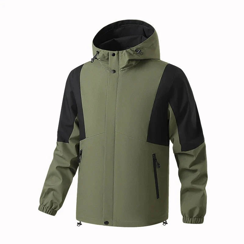Chaqueta cortavientos deportiva para hombre, verde.
Capucha con cordón ajustable, bolsillos para las manos con cremallera.