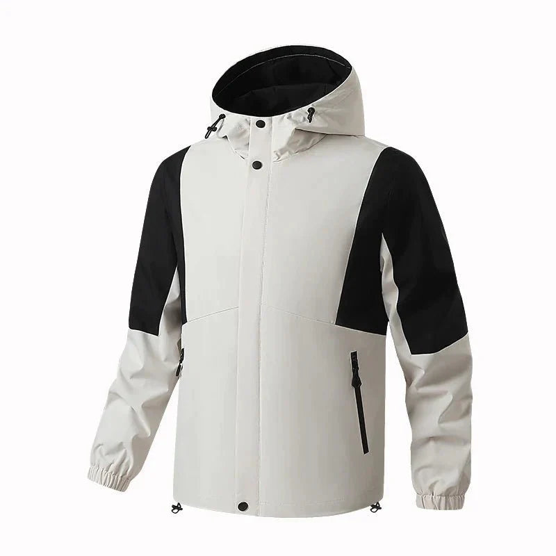 Chaqueta cortavientos deportiva para hombre, caqui.
Capucha con cordón ajustable, bolsillos para las manos con cremallera.