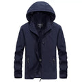 Chaqueta cortavientos para hombre, impermeable y con capucha desmontable, azul.