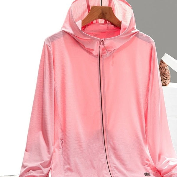 Chaqueta cortavientos ultrafina para mujer con protección UV.
Bolsillos con cremallera y capucha fija, rosa.