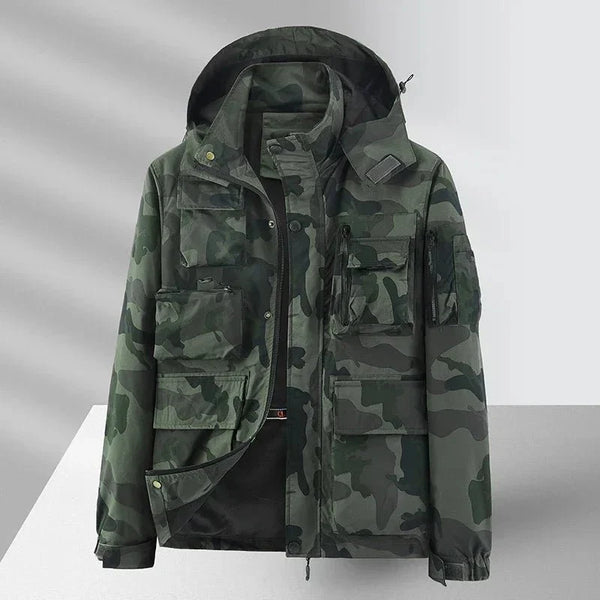 Chaqueta cortavientos camuflaje para hombre, estilo parka, con forro.
 Bolsillos internos con cremallera, capucha impermeable extraíble, camuflaje verde.