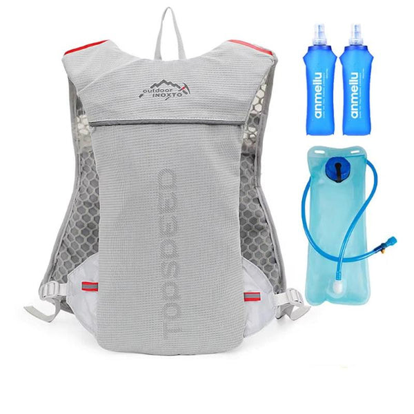 Mochila de hidratación con recambio de 2 litros y 2 botellas de 500ml.
